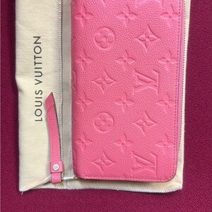 Authenticated Louis Vuitton Pink/Coral Monogram Empreinte Zippy Leather Wallet